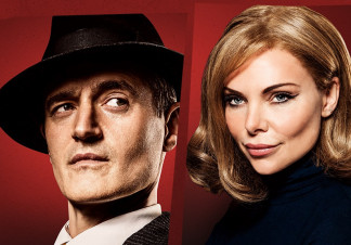 Tom Chambers appears as Tony Wendice, wearing a suit and a fedora. Samantha Wonack appears as Margot Wendice, ,wearing dark clothing